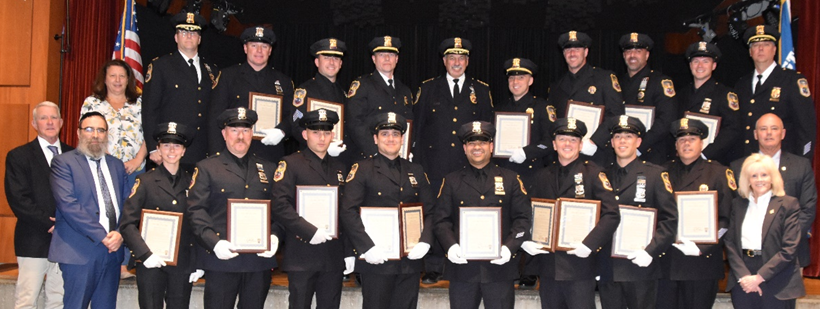Port Washington Police District Commissioners and top brass honor 20 officers for their dedication to the Port Washington community.