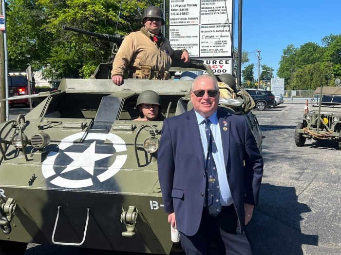 Deputy Minority Leader Arnold Drucker with a tank in Plainview