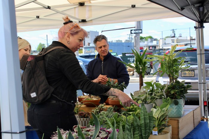 James Vassiliades of beach-n-barn designs sells handmade plant designs.