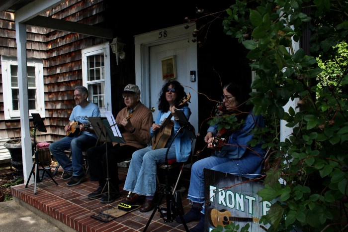 The Front Porch Players perform on the porch of the Dodge Homestead.