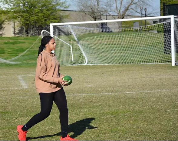 Intramural flag football player at SUNY Old Westbury