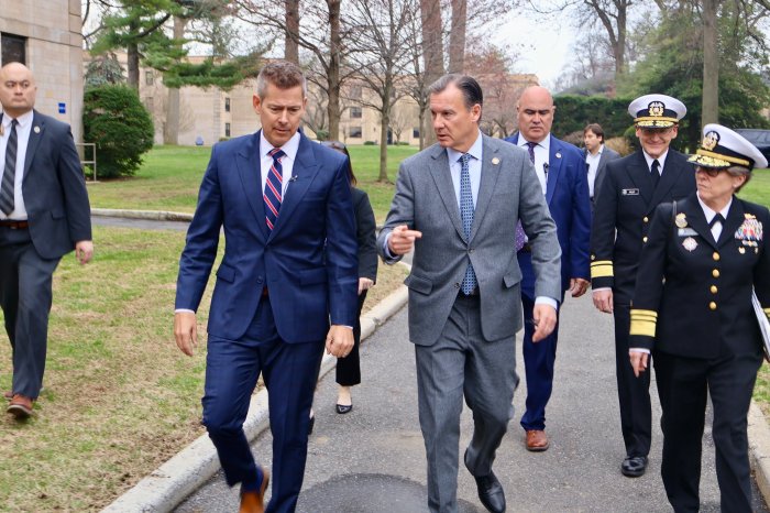 Rep. Tom Suozzi (R.) walking with U.S. Department of Transportation Secretary Sean Duffy at the U.S. Merchant Marine Academy in April.
