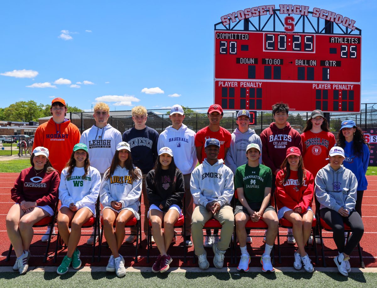 Syosset High School student-athletes stand together to celebrate their college commitments.