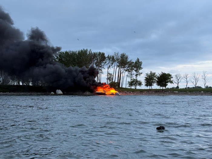 The boat fire blazed in the Long Island Sound near Hart Island up in the Bronx.