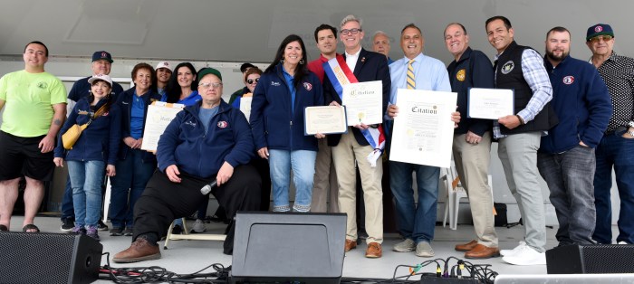 The Massapequa Chamber of Commerce and elected officials at the street fair