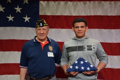 Locust Valley Senior Ricardo Moran-Cruz, who is joining the Marines this summer, took a moment to meet with marine veteran Joseph DiLorenzo.