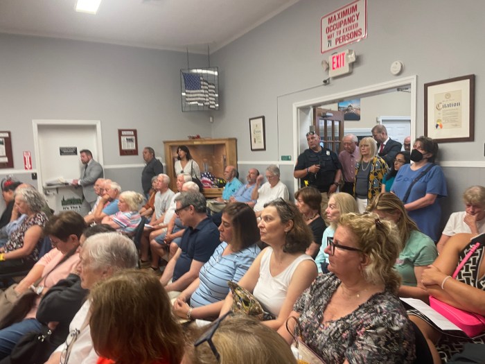 Over 50 residents packed village hall for a public forum.