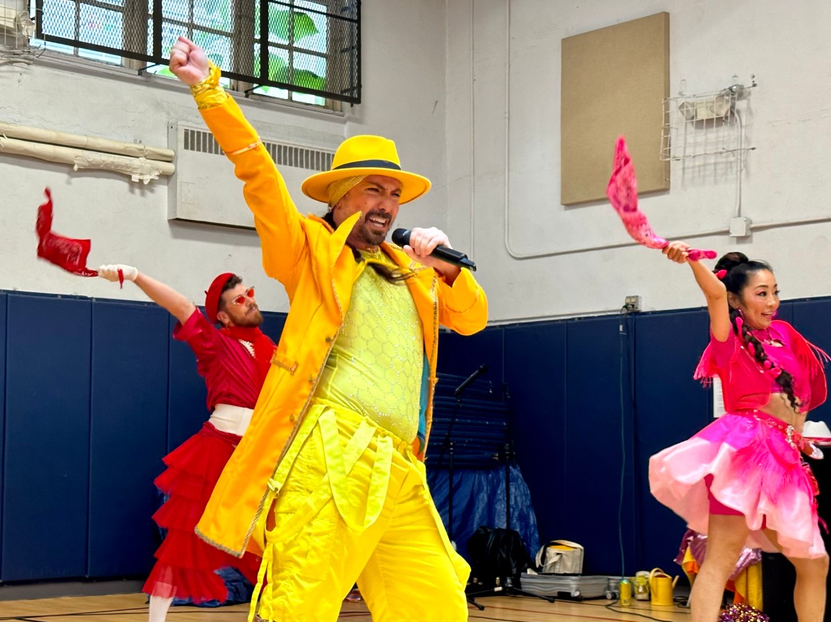 Singers and dancers from Sunshyne + the Foxx perform at Be The Rainbow' pride event in Port Washington.