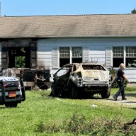 A driver died after crashing into the Manhasset Quaker meeting house. The car erupted into flames, which then spread to the building.