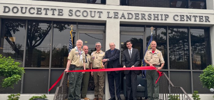 Honoree David R. Doucette, Council President Michael B. Malloy, Past Council Presidet Christopher Maher, Past Council President Gerald Kaiser, Nassau County Scouting America CEO Christopher M. Coscia and Past Council President Andy Johns (L. to R.) cut the ceremonial ribbon at the renaming of the Theodore Roosevelt Council, Scouting America headquarters.