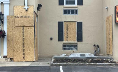The entryway of the Locust Valley Fire Department was struck by a pickup truck in an auto accident which hospitalized the driver.