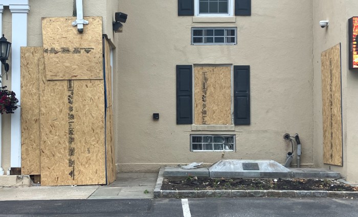 The entryway of the Locust Valley Fire Department was struck by a pickup truck in an auto accident which hospitalized the driver.