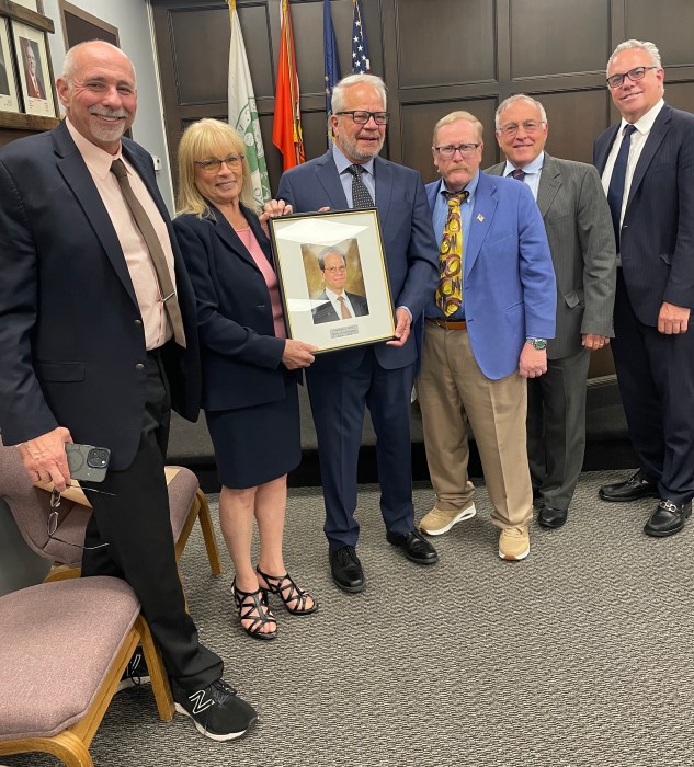 Former Farmingdale Mayor George Graf has his plaque added to 'Wall of Honor'
