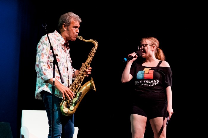 Mark Rivera performs with a Long Island High School of the Arts student during his visit on Wednesday, June 4.