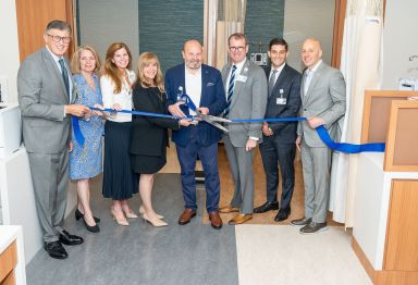 Dr. Richard Barakat, North Hempstead Town Supervisor Jennifer DeSena, Eileen O’Donnell, Rita Mercieca, Dr. A. Samer Al-Homsi, Jon Sendach, David Brody and Dr. Michael Gitman (L.-R.) at the ribbon cutting for Northwell's expanded R.J. Zuckerberg Cancer Center.