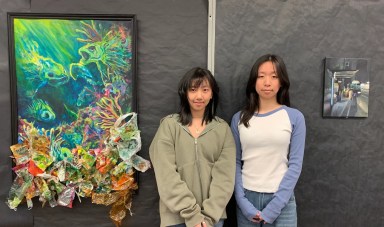 Kaitlyn Wu (L.) with her piece “Eternal Breath,” and Grace Chen (R.), with her piece “Convergence."