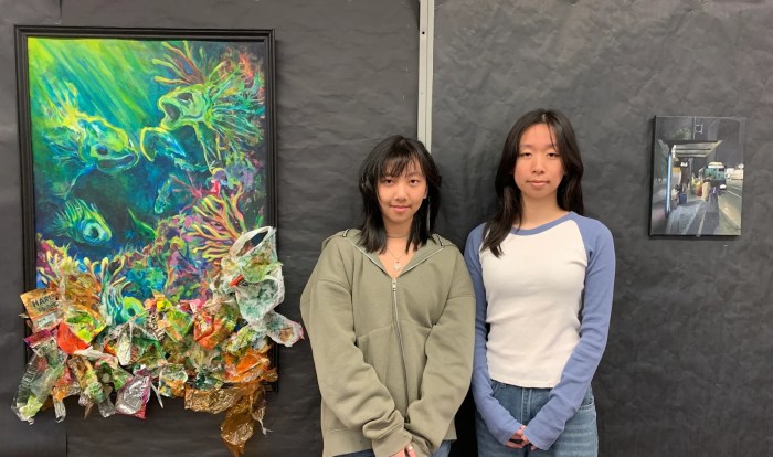 Kaitlyn Wu (L.) with her piece “Eternal Breath,” and Grace Chen (R.), with her piece “Convergence."