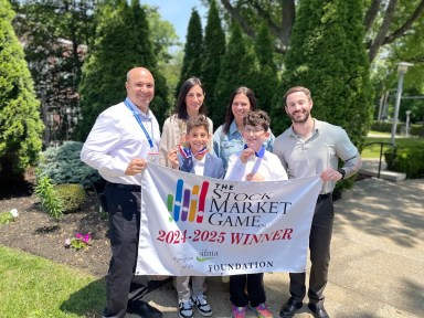 Saddle Rock Elementary School fourth-graders Noah Hollander and William Friedman placed first and third, respectively, in the Stock Market Game.