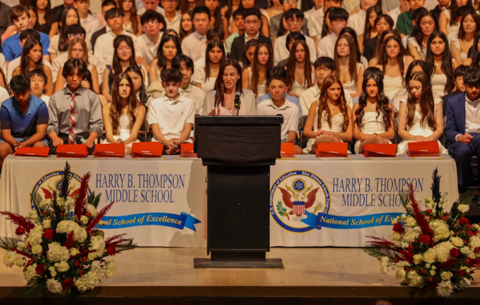 Lynn Abramson, board of education trustee, speaks at the H.B. Thompson moving up ceremony.