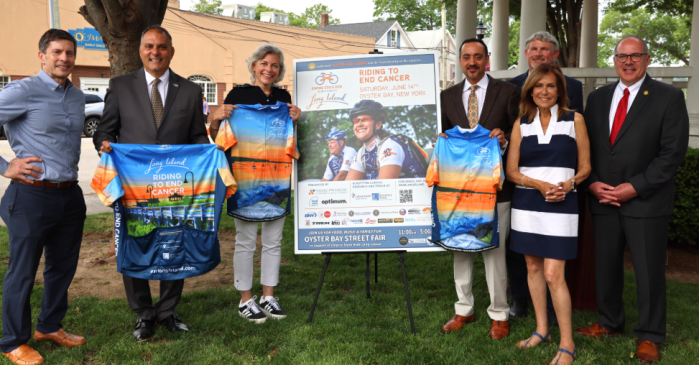 Steve Mars. Joseph Saladino, Stacey Sager, Dr. Ashish Sangal, Terry Bourgeois, Carol Silva and Rich LaMarca (L. to R.) announce the town's partnership with Empire State Ride.