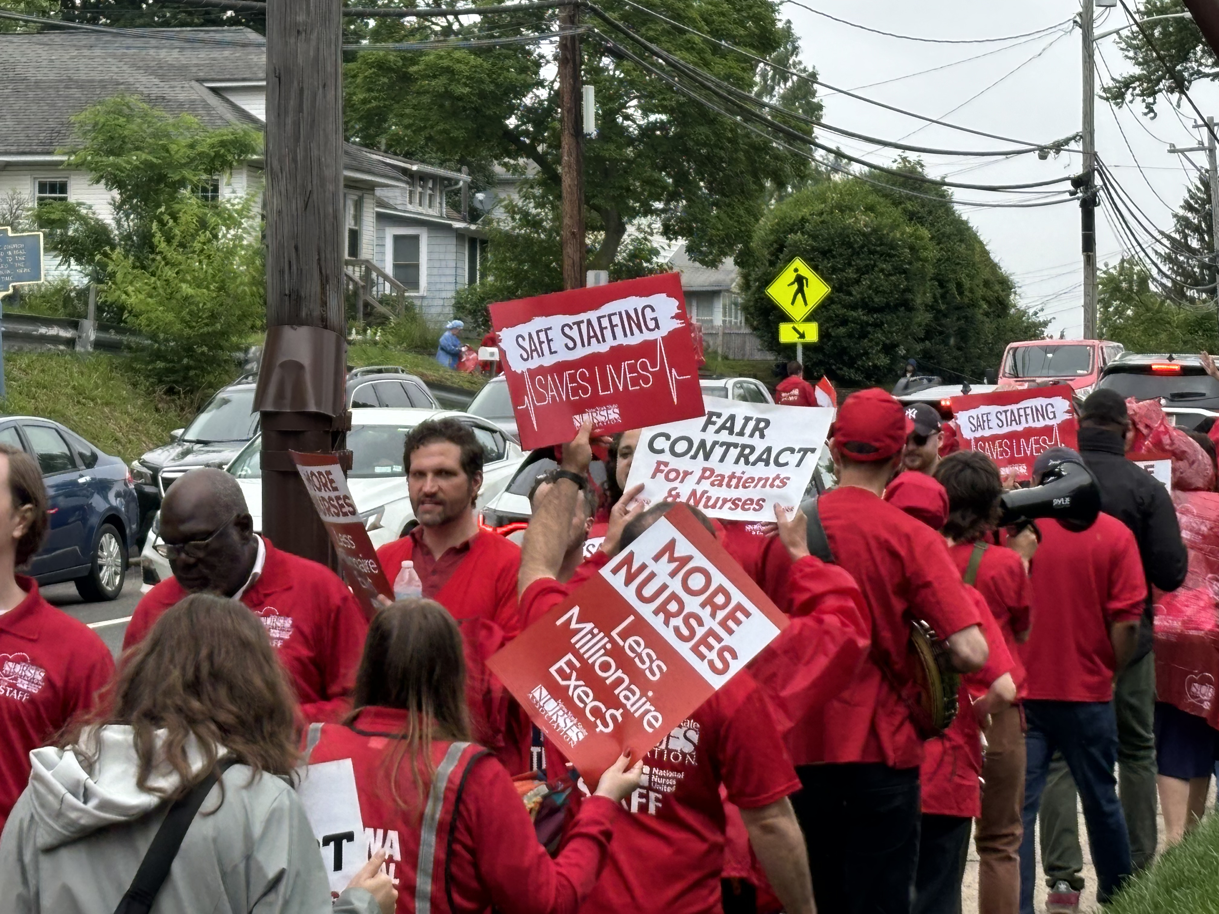 Nurses picket outside of Huntington Hospital to demand fair contracts and safer staffing practices from its parent company, Northwell Health.