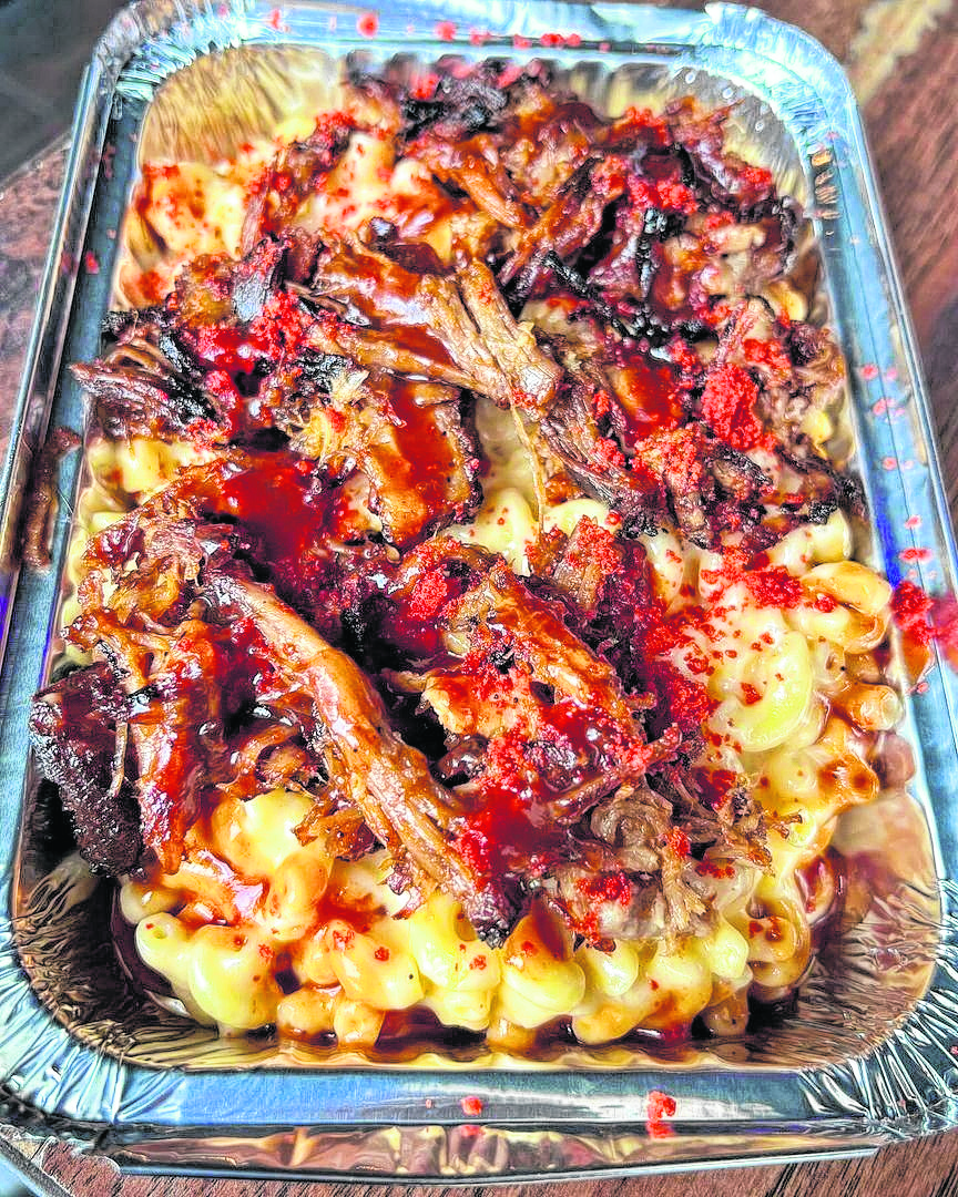 The viral pulled pork mac and cheese from restaurant Street to Table is the perfect meal for BBQ lovers.