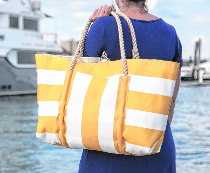 This fashionable and environmentall-friendly beach bag is one of 10 summer vacation essentials you'll love.