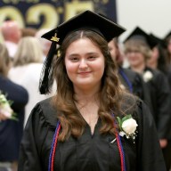 Village School graduating seniors walk in the 55th graduation ceremony.