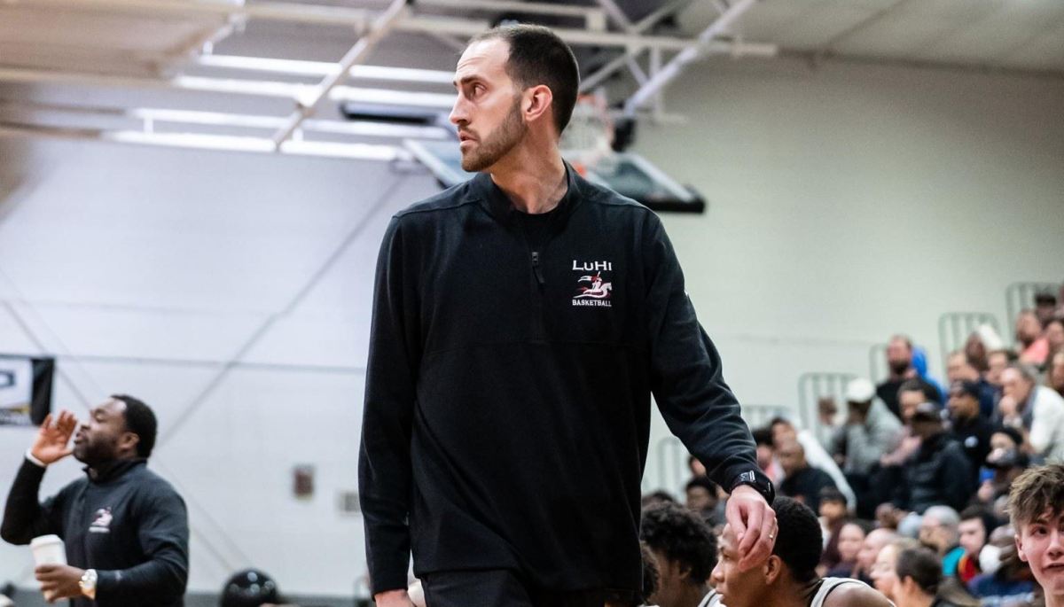 John Buck has been Long Island Lutheran High School's basketball coach for over 15 years, leading the program to several championships.