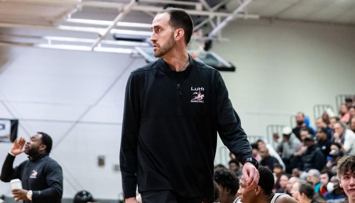 John Buck has been Long Island Lutheran High School's basketball coach for over 15 years, leading the program to several championships.