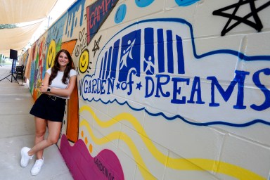 Roslyn native, Corey Paige, was commissioned to paint a mural on the all new changing station walls at Sunrise Day Camp.