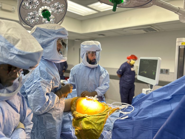 Dr James Germano chair orthopedics LIJ Valley Stream using Ortoma device during surgery 6 25 25
