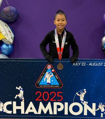 Great Neck gymnast Caila Smith finished in third for vault at the Junior Olympics, where she competed as one of the youngest gymnasts.