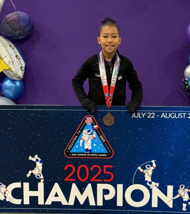 Great Neck gymnast Caila Smith finished in third for vault at the Junior Olympics, where she competed as one of the youngest gymnasts.