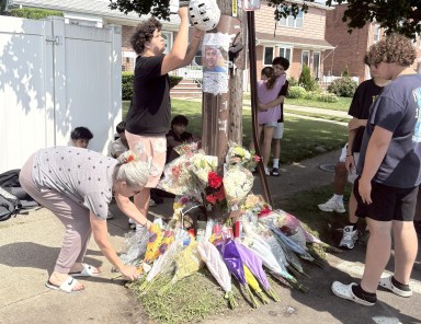 Friends and family gathered Monday night at the crash site where Antonio Benitez died.