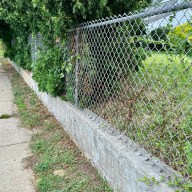A residential fence along I U Willets Road.