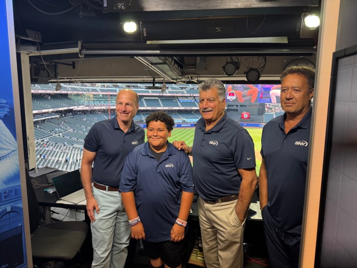 Mets play-by-play announcer Gary Cohen, Antonio Veneziano, SNY commentators Keith Hernandez and Ron Darling (L. to R.) in the booth for the fourth inning of the New York Mets' game against the Los Angeles Angels.
