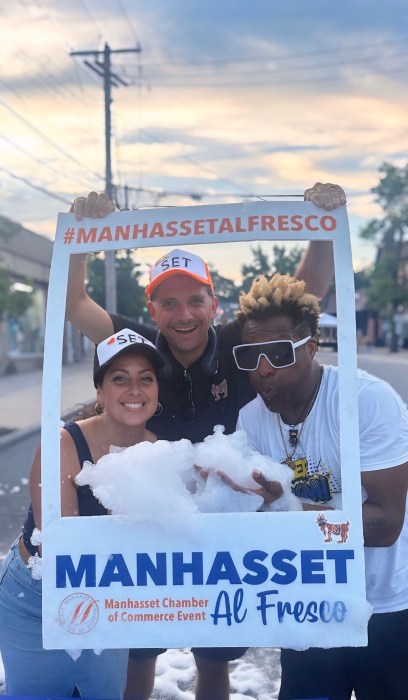 Antonietta Manzi and Matthew Donno, Manhasset Chamber of Commerce co-presidents, and Kershel Anthony, chamber board member and owner of Kerboom Kidz (L. to R.).