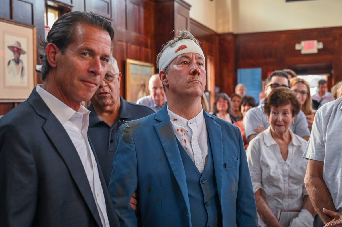 The North Shore Historical Museum hosted an event for the launch of a new biography on Frank Holt, the man who shot financier J.P. Morgan. Greg Bodine (center) portrayed Holt in a live action performance.