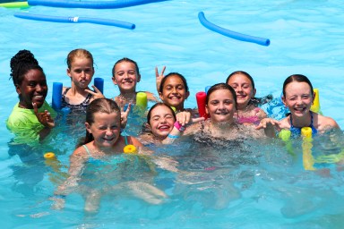 LuHi campers cool off in the pool after a day of activities.