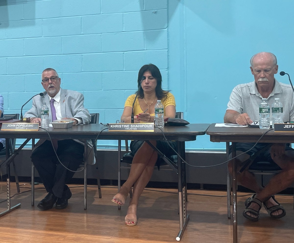 (L. to R.) Mayor John Popeleski, trustees Khristine Shahipour and Jeffrey Stone at the July Manorhaven Board of Trustees meeting.
