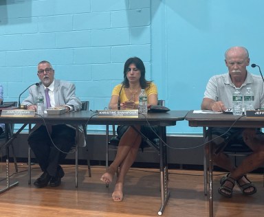 (L. to R.) Mayor John Popeleski, trustees Khristine Shahipour and Jeffrey Stone at the July Manorhaven Board of Trustees meeting.