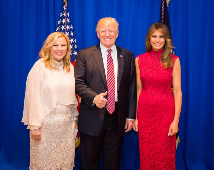 Sherry Xue Li, who pleaded guilty to conspiracy and money laundering charges, with President Donald Trump and First Lady Melania Trump (L. to R.).
