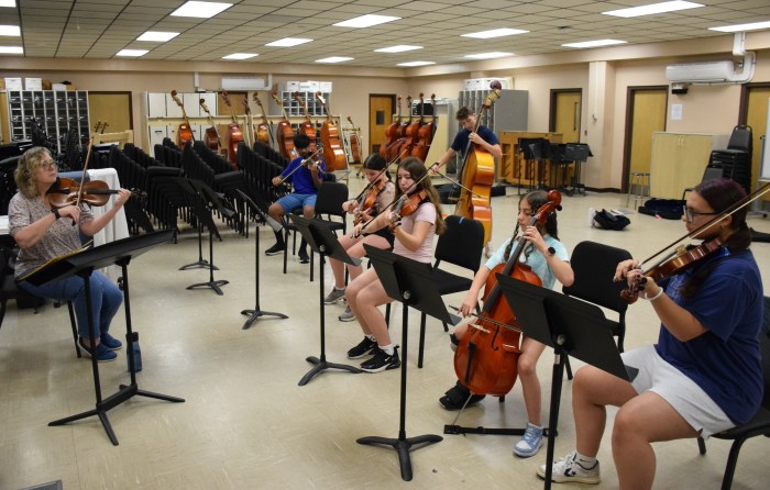 Teacher Katherine Cahalan led an orchestra class as part of the Massapequa School District’s Summer Fine Arts program.