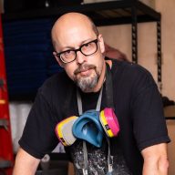 Port Washington artist Kevin Champeny transforms thousands of hand-cast objects into striking mosaic sculptures that blur the line between art, craft, and conversation.