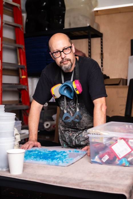 Port Washington artist Kevin Champeny transforms thousands of hand-cast objects into striking mosaic sculptures that blur the line between art, craft, and conversation.