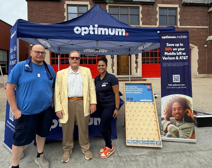 Farmingdale Mayor Ralph Ekstrand (C.), along with representatives from Optimum, who were one of the sponsors of Farmingdale Music on Main.