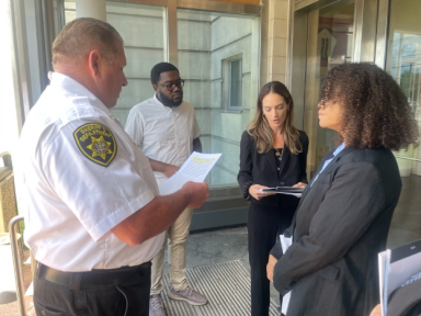 Senator Salazar and Assembly Solages read Section 500-J of the New York State Correction Law to East Meadow Jail facility officials, which permits them to tour the jail at their pleasure.