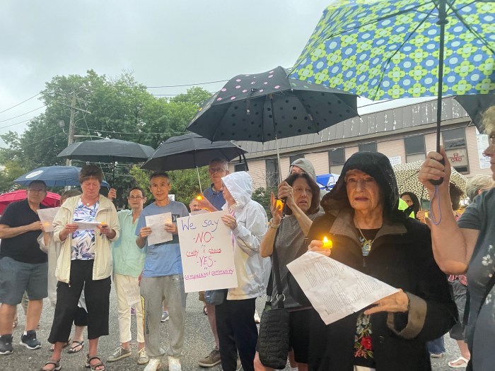 The rain didn't deter Port Washington residents from singing together.