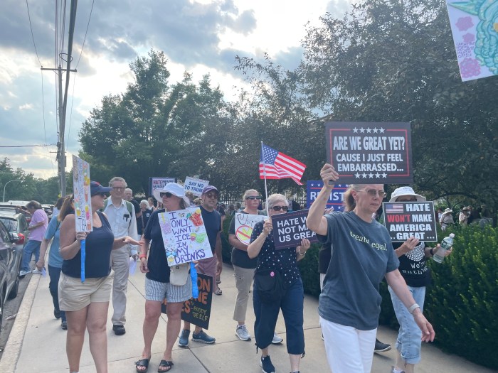 Protestors had to march across the street to the Nassau County Police Department, after being told they had to move from the lawn of the Nassau County Legislature.
